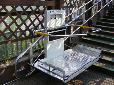 Inclined barrier (wheelchair) lifting platform