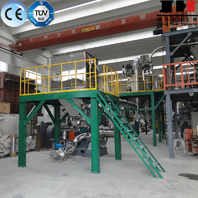 Turbo impact mill with internal air classifier