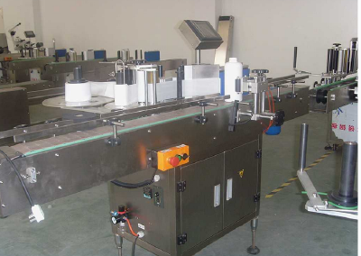 Fixed point round bottle labeling machine