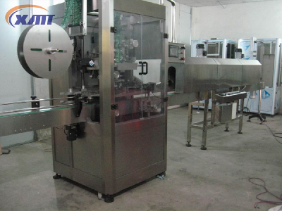 automatic sleeve labeling machine