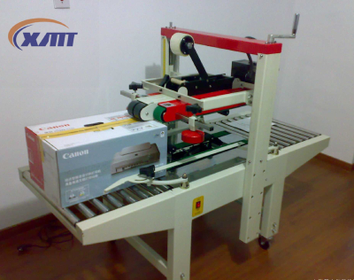 Carton box folding and sealing machine