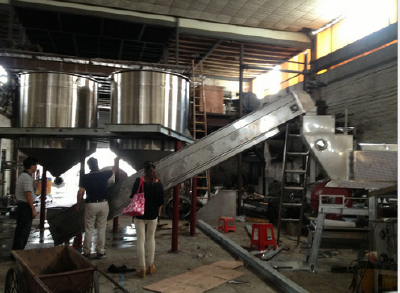 Continuous large-scale rice cooking machine