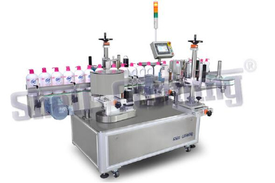 Double star wheel round bottle labeling machine