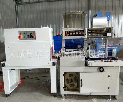 Heat shrink packaging machine