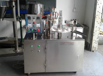 Filling and sealing machine