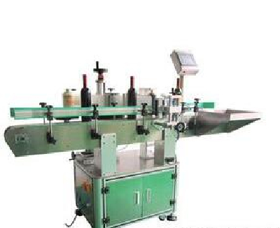 Automatic round bottle positioning and labeling machine