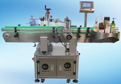 Bottle positioning labeler