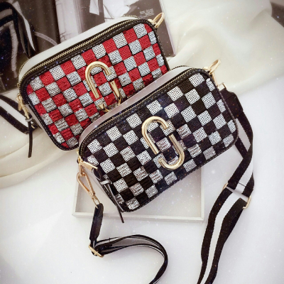 Inclined shoulder bag