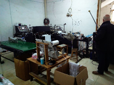 Fully automatic bottom sealing bag soft handle bag making machine