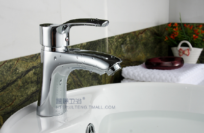 Single hole hot and cold tap for bathroom wash basin