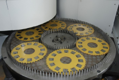 Compressor valve blade surface grinding