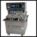 Food tray vacuum packaging machine