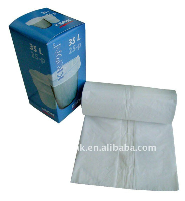 Star-sealed white t-shirt trash bag on roll